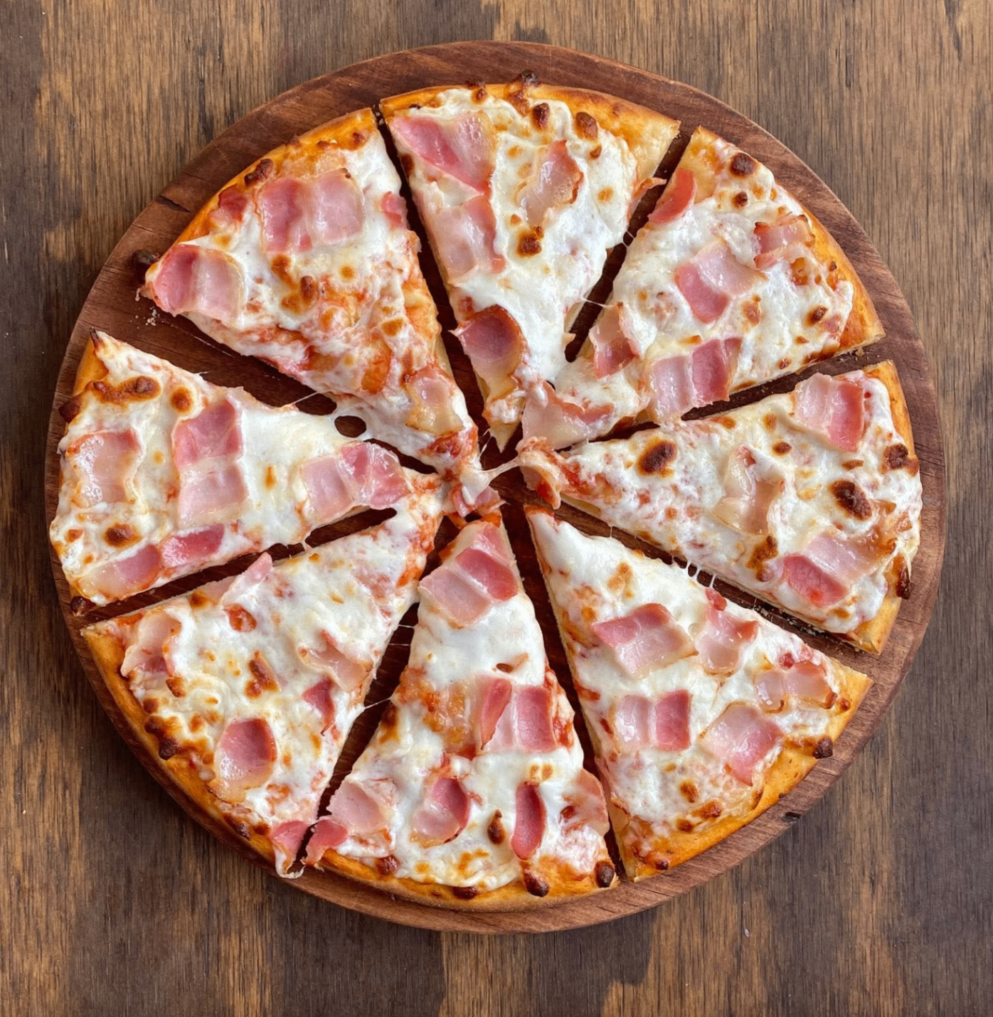 Pizza de tocino de Pizzas Milas